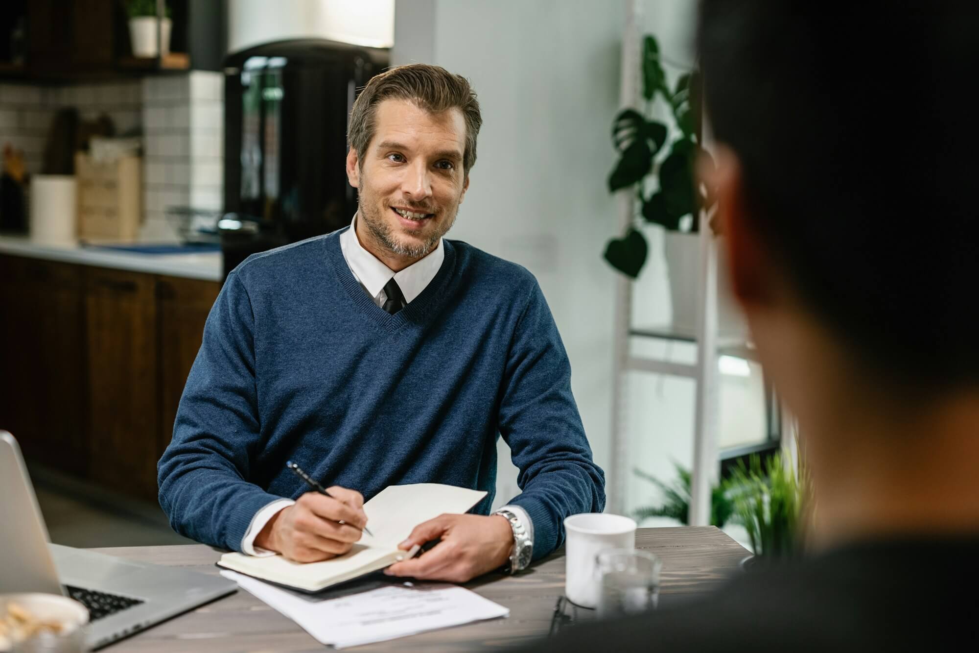 financial-consultant-planning-home-finances-with-his-client-.jpg